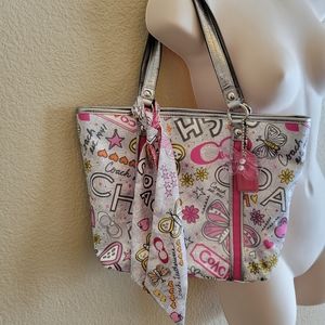 Like brand new authentic Coach purse w charm & purse scarf.